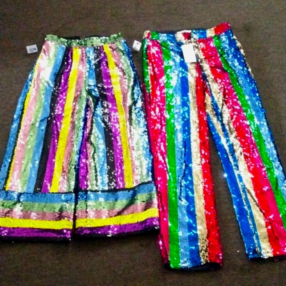 Two pairs of small girls' sequin pants
